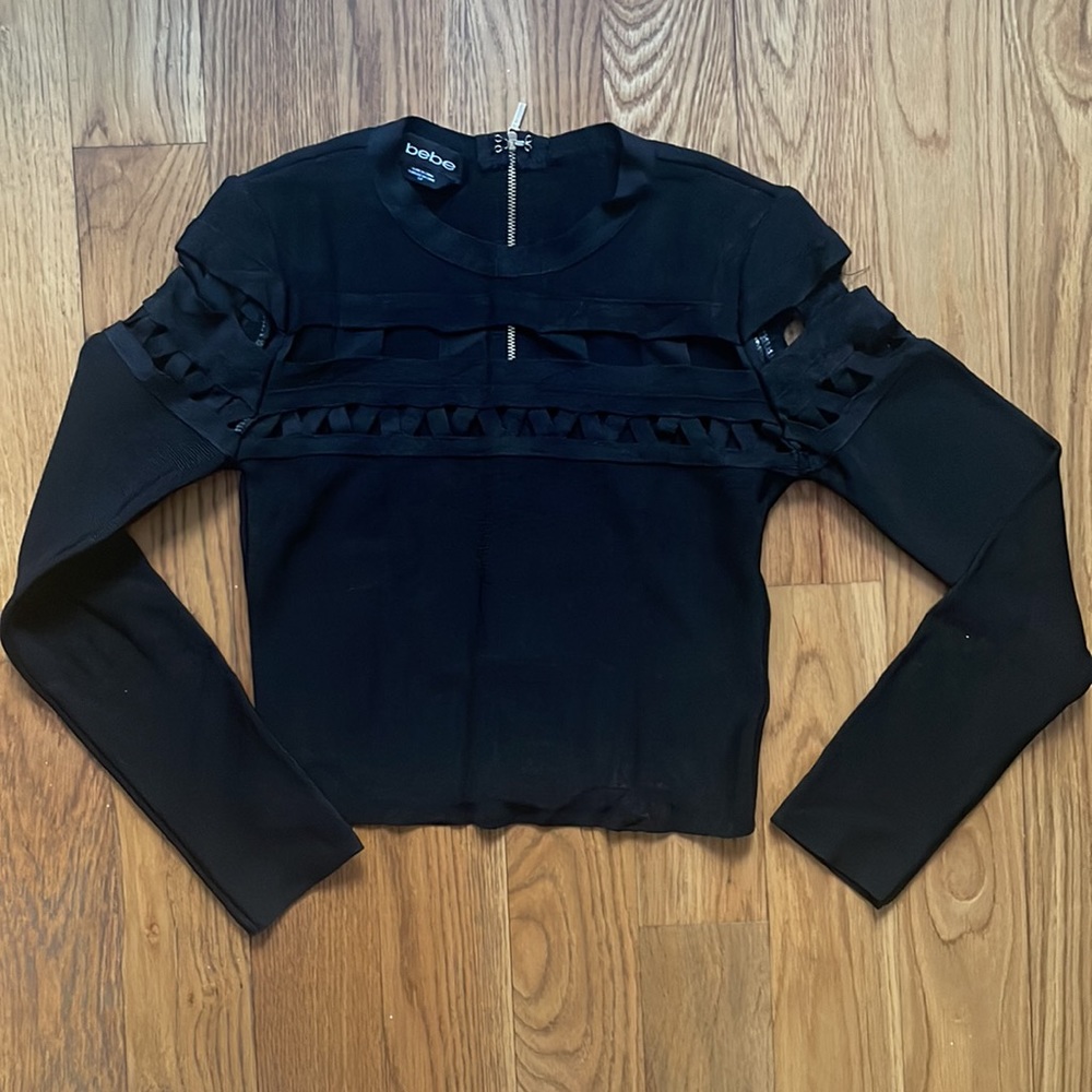 BEBE Black cutout top with back zipper closure size small
